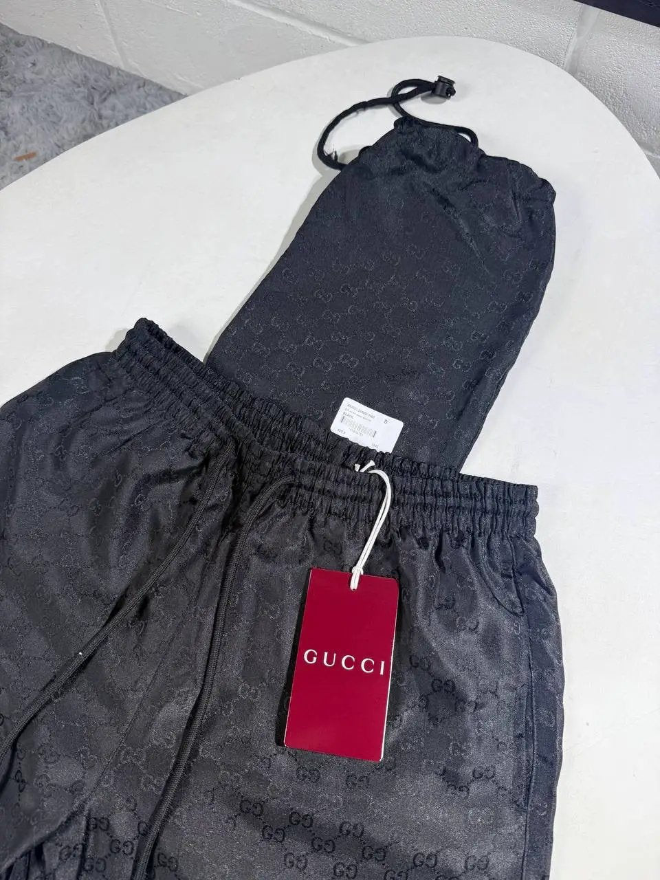 UCCI BLACK SHORTS by Stock supplier