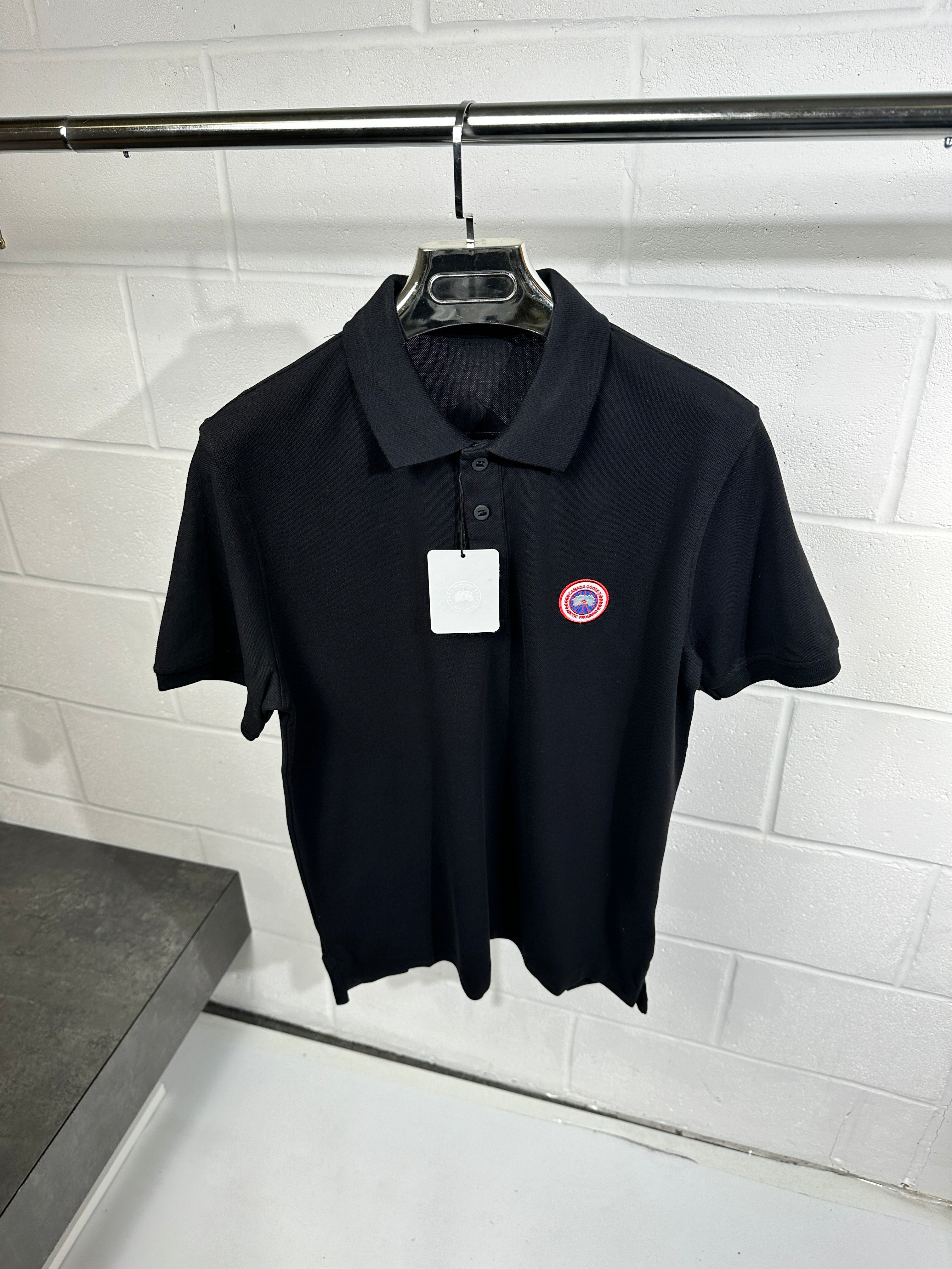 Canada goose - black polo