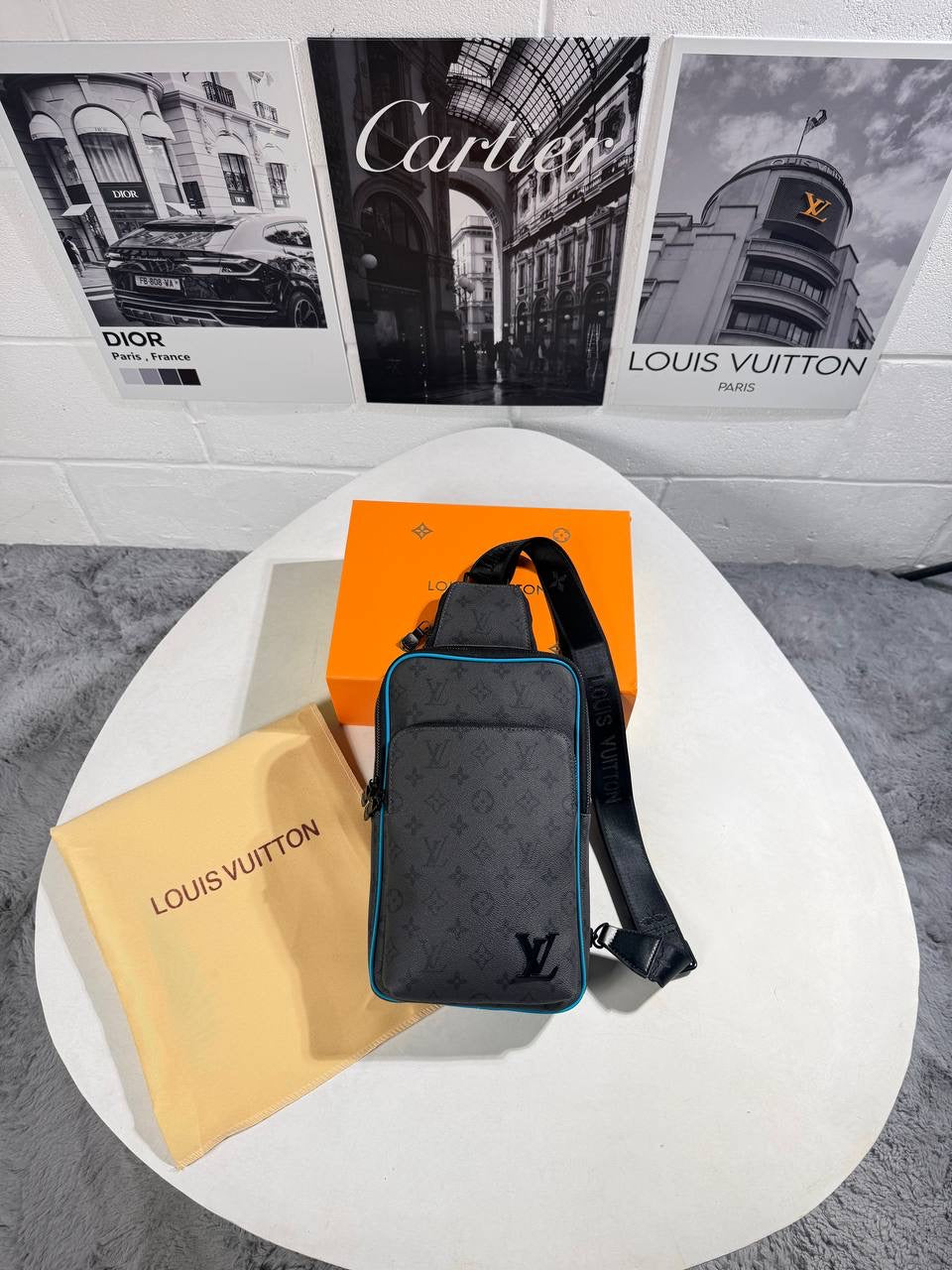 LVE MONOGRAM REVERSE SLING BAG
