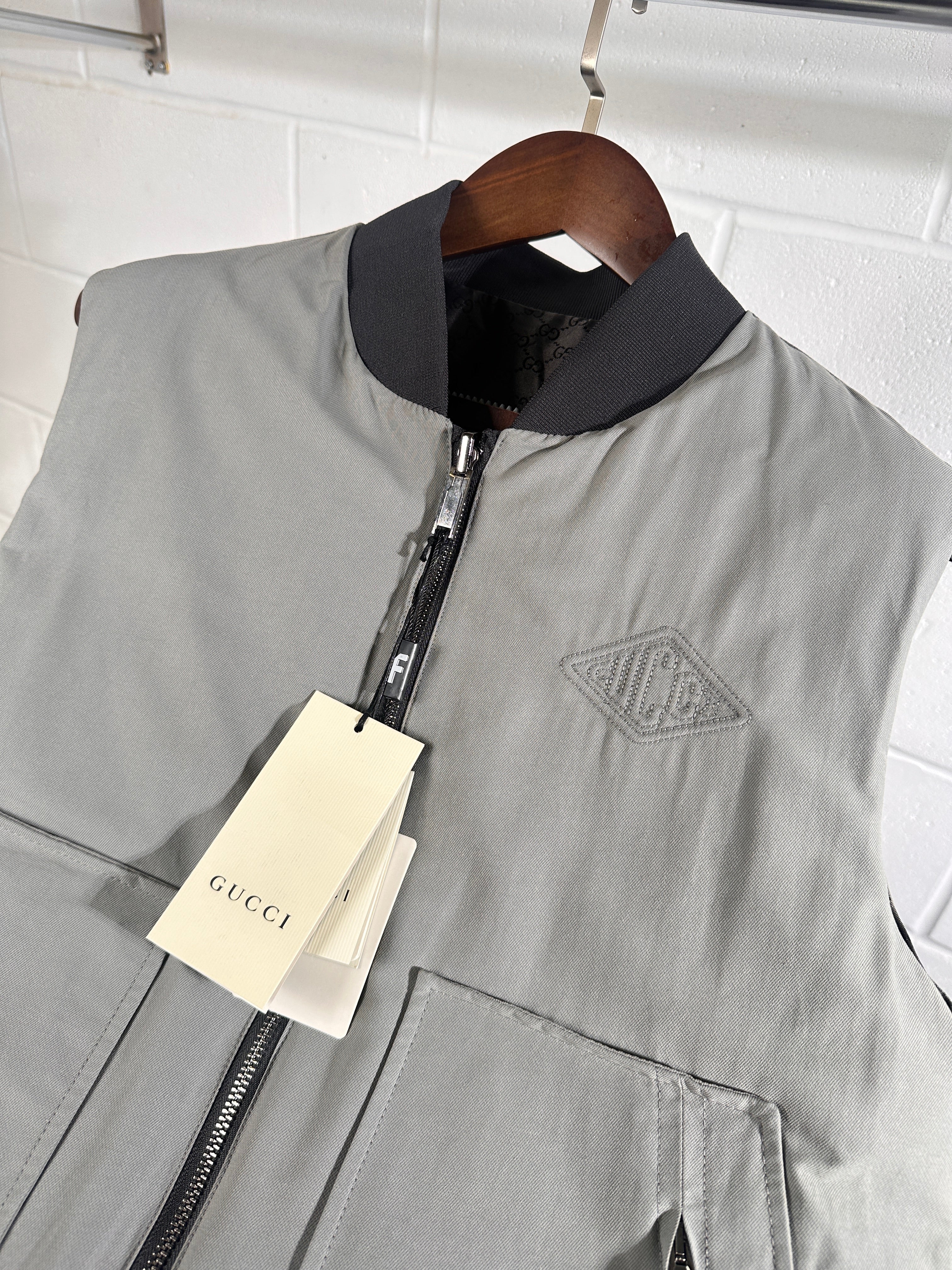 Gucci reversible body warmer grey